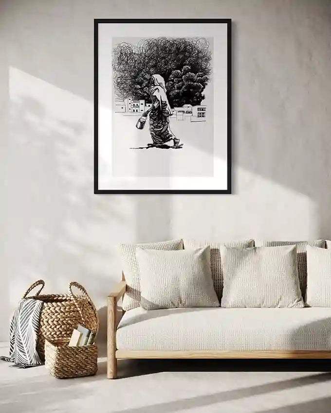 The Rhythm of Her Steps art print by Obada Gabir in black frame above modern beige sofa with wicker baskets and pillows