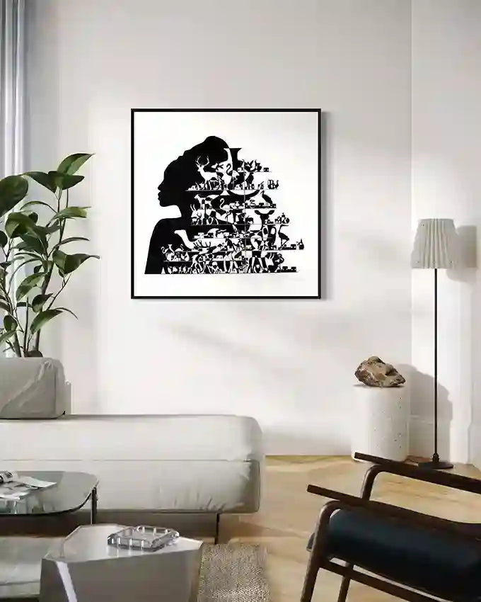 African Queen canvas in modern living room with black and white silhouette art by Yousif Ibrahim framed on white wall