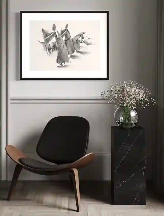 Ascension art print by Abdelrahman Buluk in black frame above modern chair with marble side table and flowers