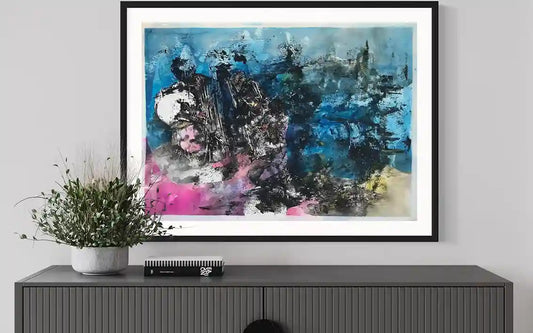 Blue Band Blue Beach painting by Samir Shareef in black frame above gray console with white planter interior mockup