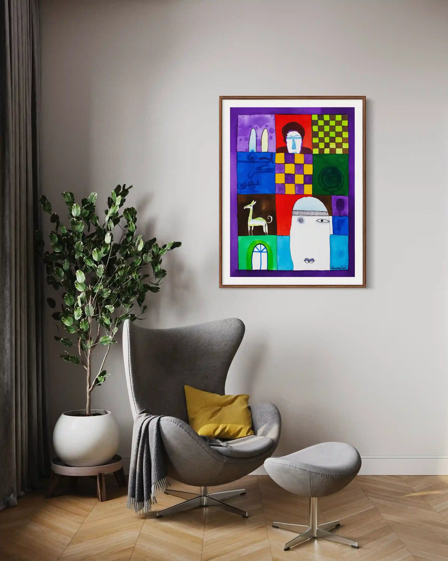 Collected Memories framed art print by Abushariaa Ahmed displayed above modern gray chair with yellow accent pillow