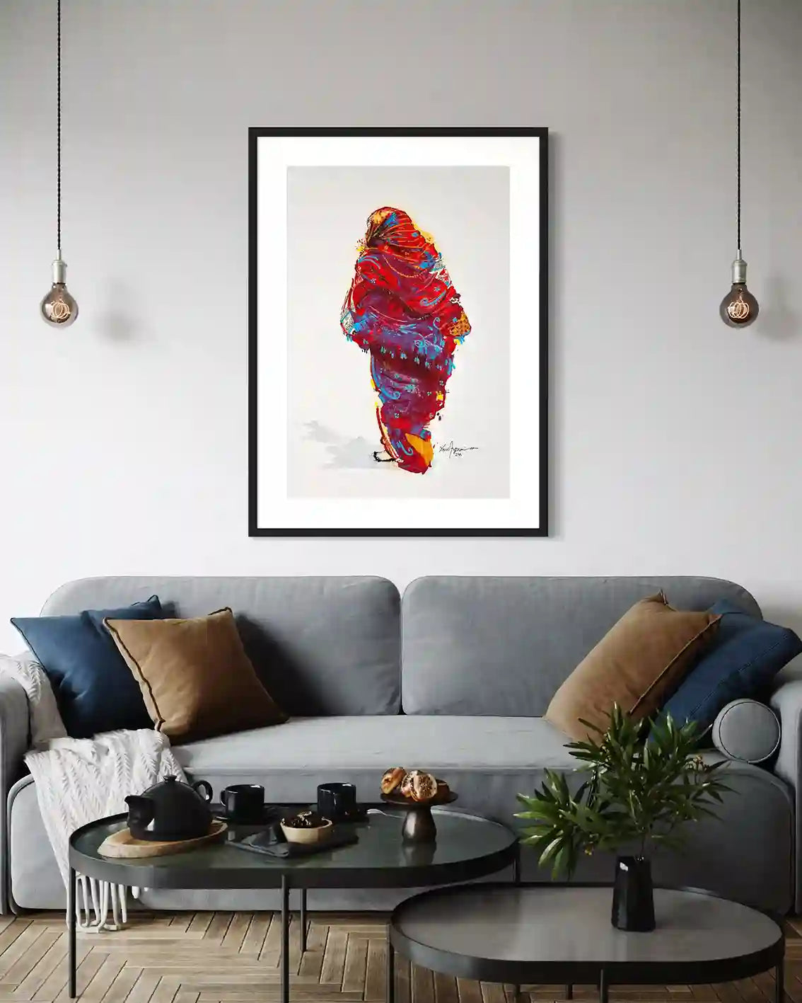 Daughters of the Nile 1 framed art print above grey sofa in modern living room with pendant lights and coffee table