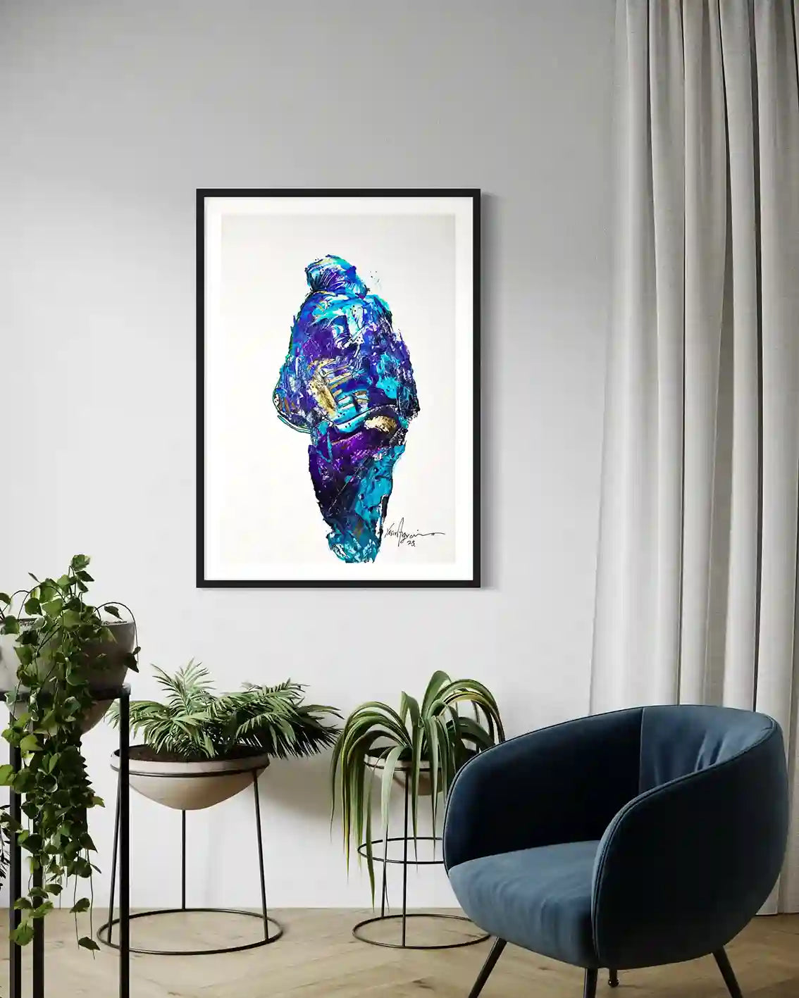 Daughters Nile 3 framed art print mockup modern living room blue chair plants wall decor Yasir Algrai Sudanese woman art