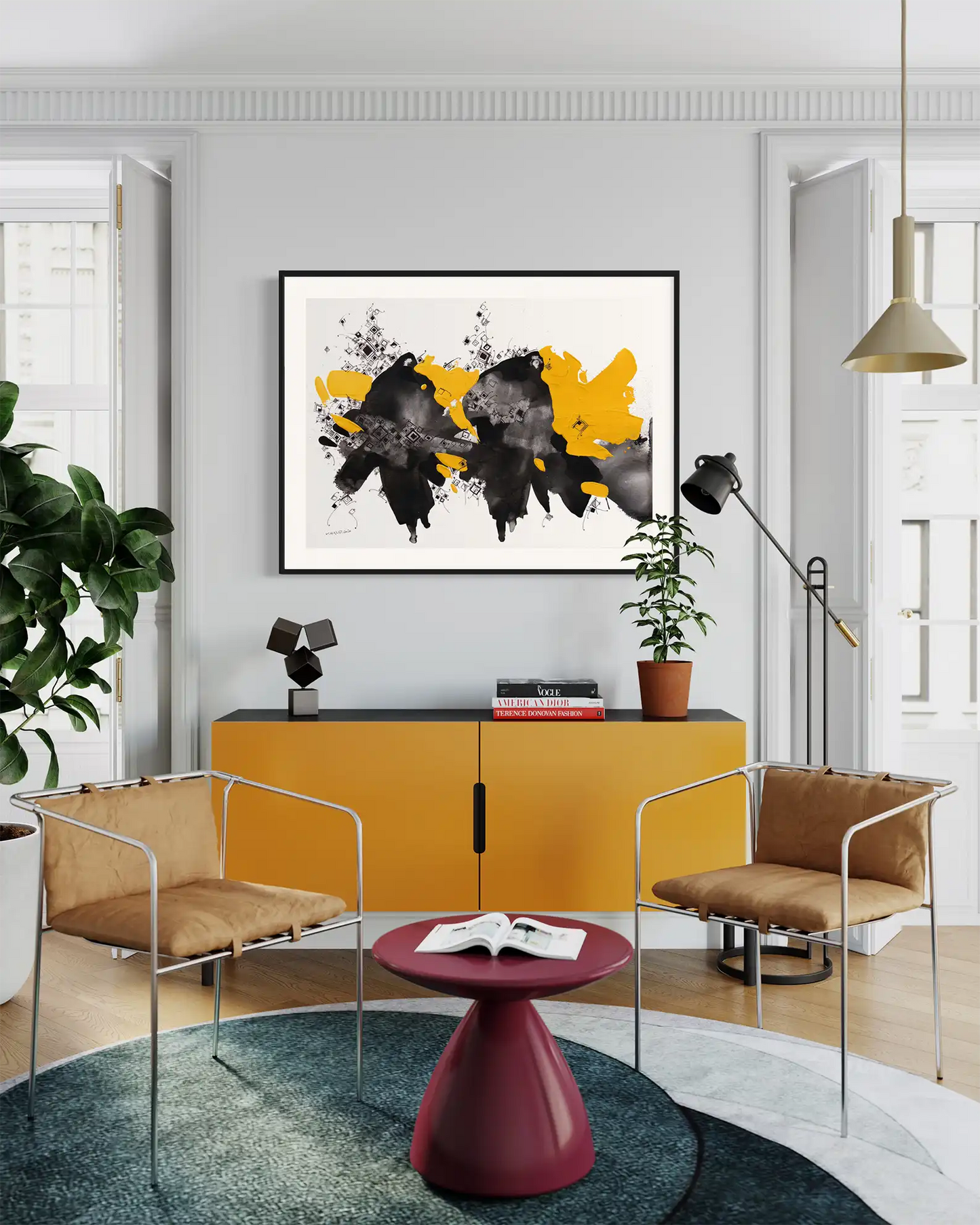 Path of Mothers abstract art print by Khalid Yan in black frame above yellow console in modern living room with chairs