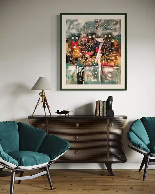 The Nile Lullaby art print by Abdelmageed Afifi displayed in green frame above modern sideboard with teal velvet chairs
