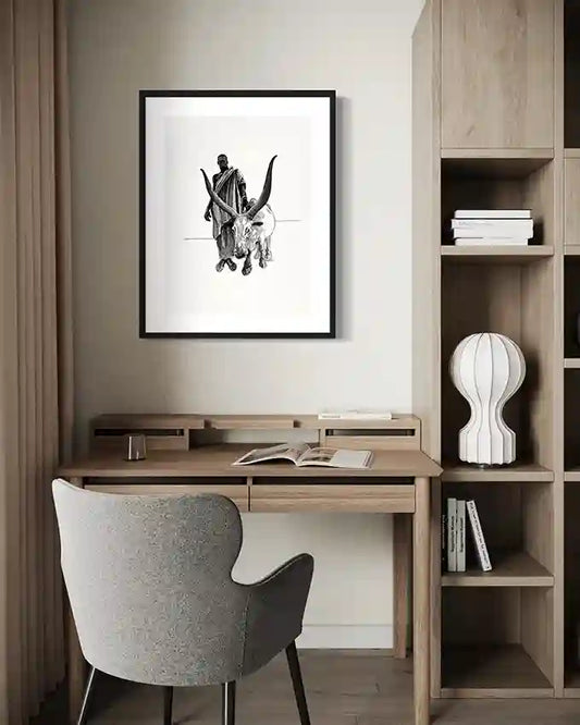 Nuba Herder black and white art print by Obada Gabir displayed in modern home office workspace with built-in desk and shelving - contemporary wall art