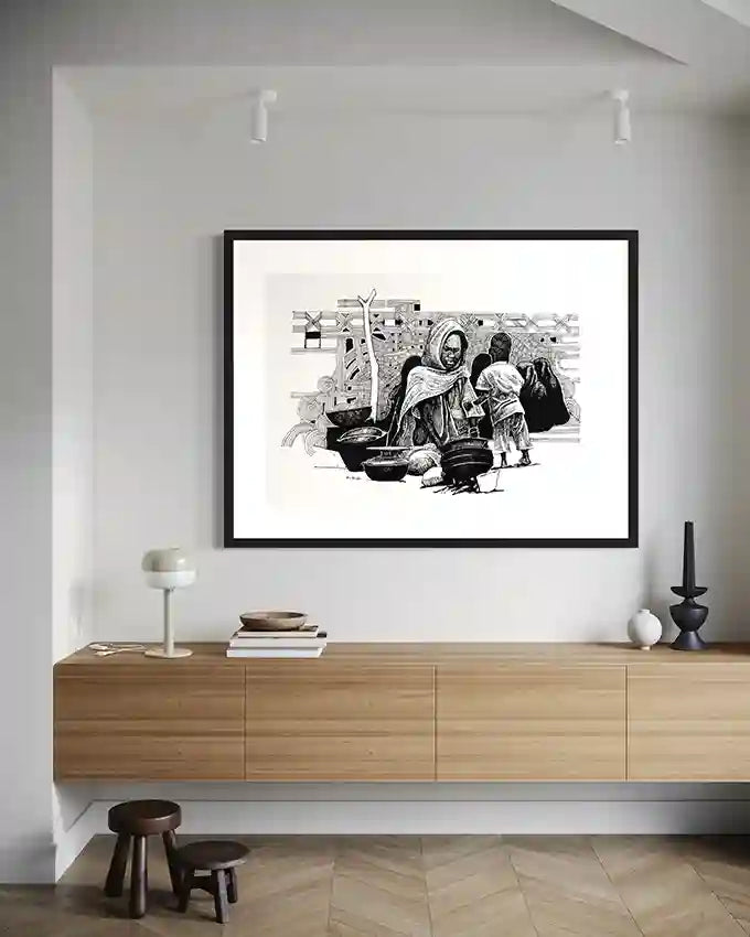 Obada Gabir African daily life art print displayed in elegant modern home interior with black frame, perfect wall art for contemporary living space