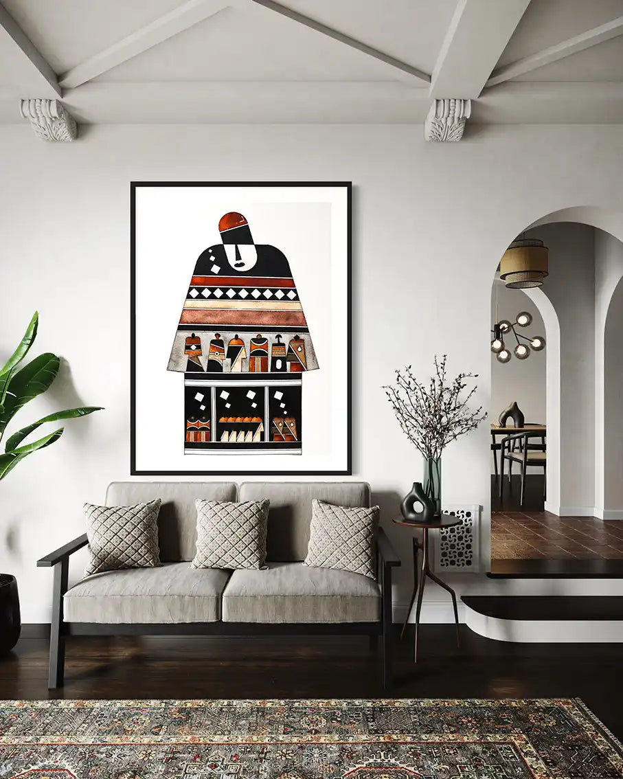 Framed artwork on a wall above a sofa in a living room. 'Armory' print by Sudanese artist Yousif Ibrahim - UAE