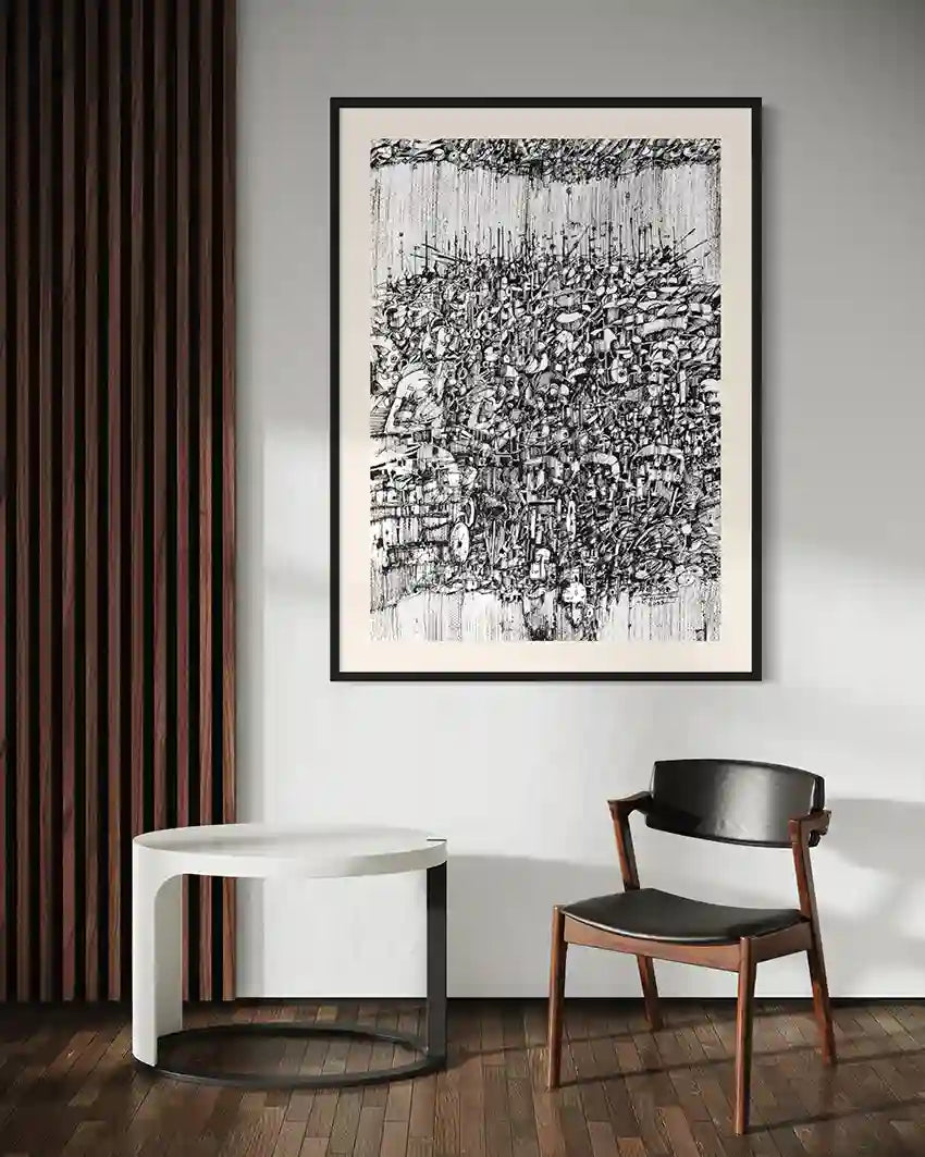 "The Weight of Rain" art print in black frame above white round table and wooden chair in modern interior with panels 