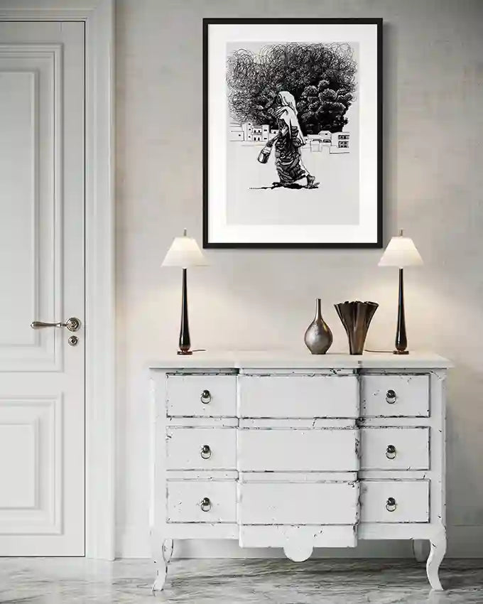 The Rhythm of Her Steps art print by Obada Gabir displayed in black frame above white vintage dresser with table lamps