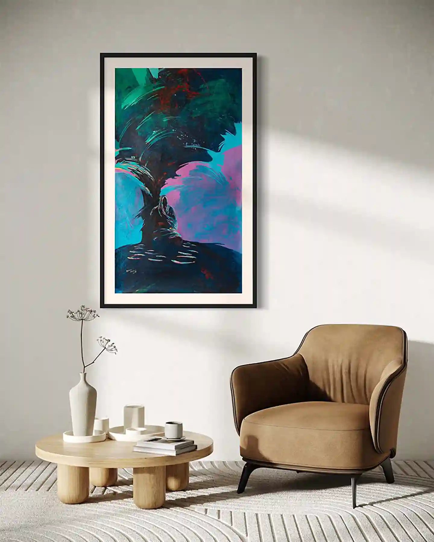 First Light by Bakri Moaz abstract art print in black frame above tan leather chair and wood coffee table interior