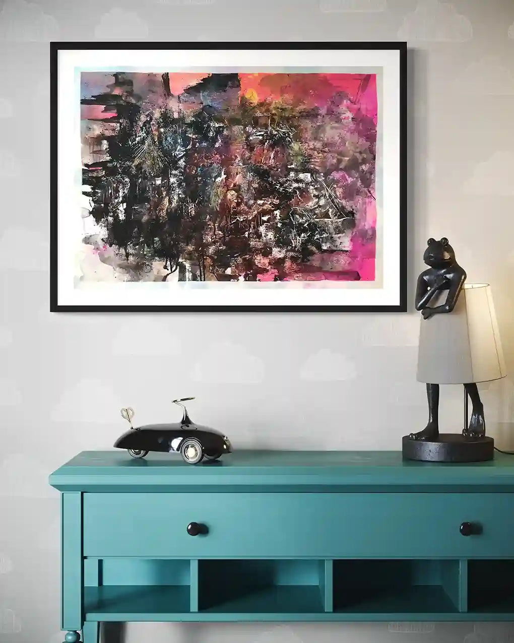 Black Prince abstract art by Samir Shareef framed on wall above turquoise console with vintage decor home interior mockup