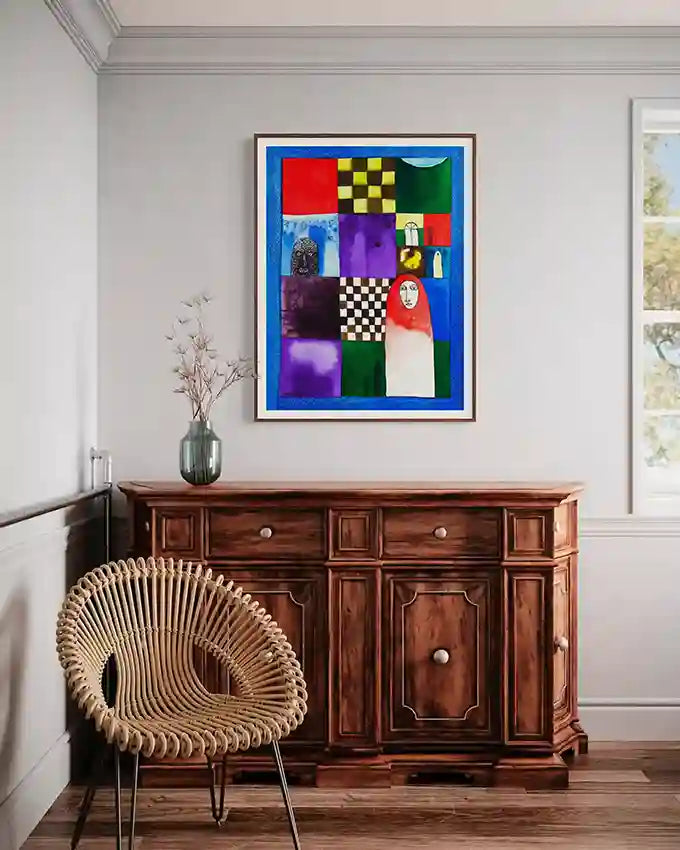 'Blue Hour' art print by Abushariaa Ahmed displayed in elegant room setting above wooden sideboard with wicker chair