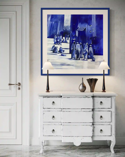 Blueprint for a Memory art print by Omer Kamal displayed in blue frame above white vintage dresser in elegant interior