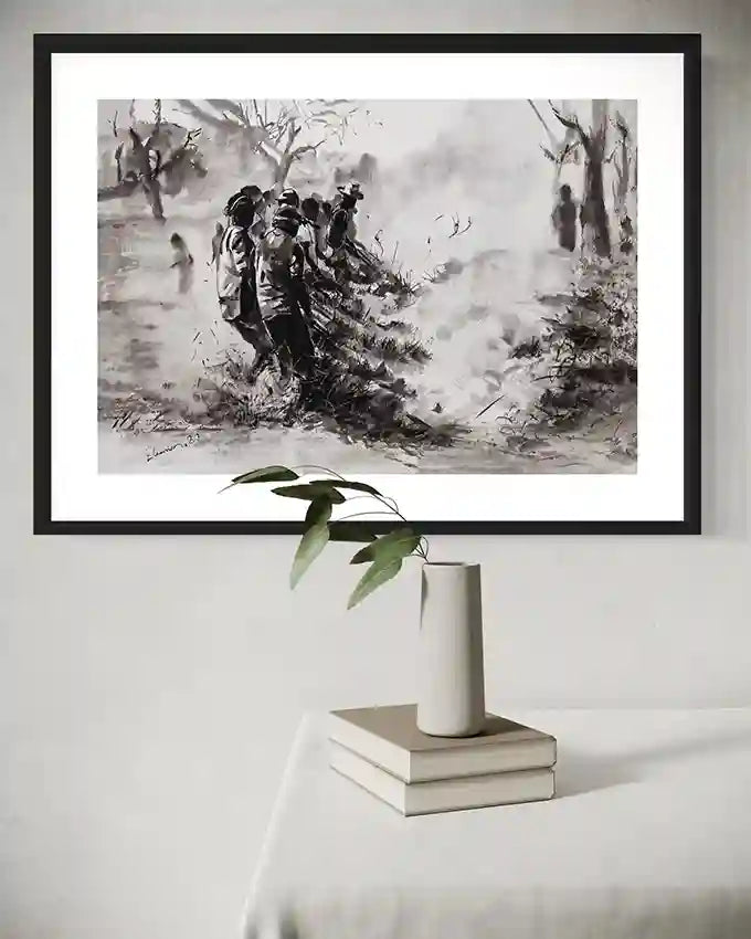 Breaking Ground framed art print by Elamin Awad displayed on wall above minimalist white vase with green branch and books