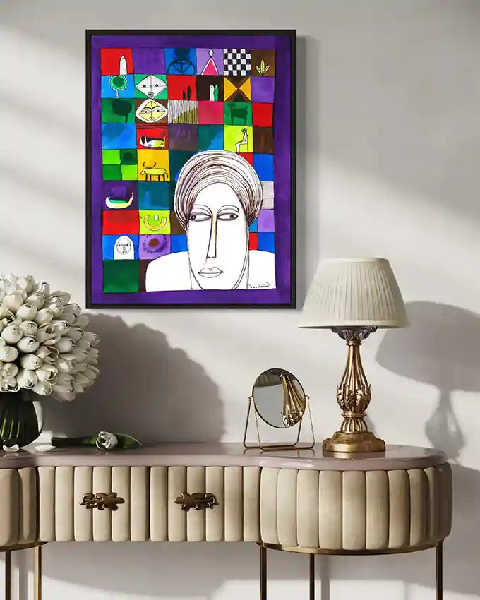 "Fragments of Identity" by Abushariaa Ahmed displayed in elegant interior with vintage furniture and brass lamp