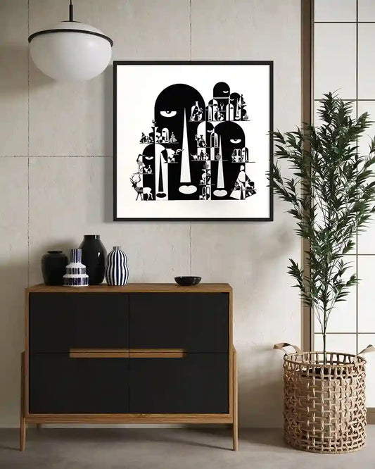 Tombs black and white art print by Gungalito in black frame displayed in modern living space with sideboard and plant