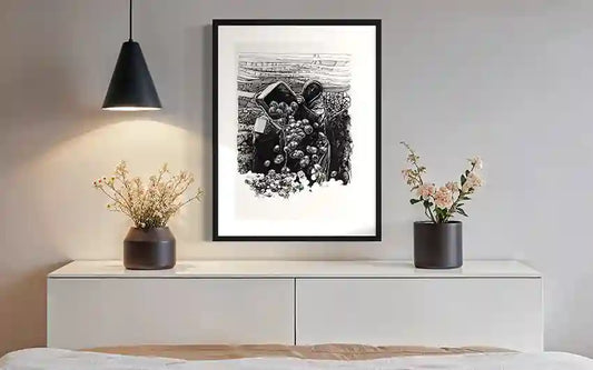 The Harvest black and white art print by Obada Gabir displayed in modern dining room with black frame 