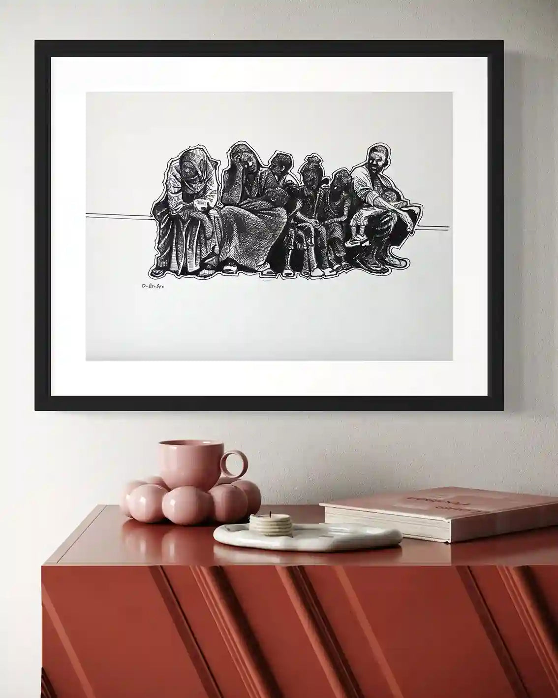 
In Limbo framed ink drawing by Obada Gabir displayed above modern console table with decorative objects, wall art mockup