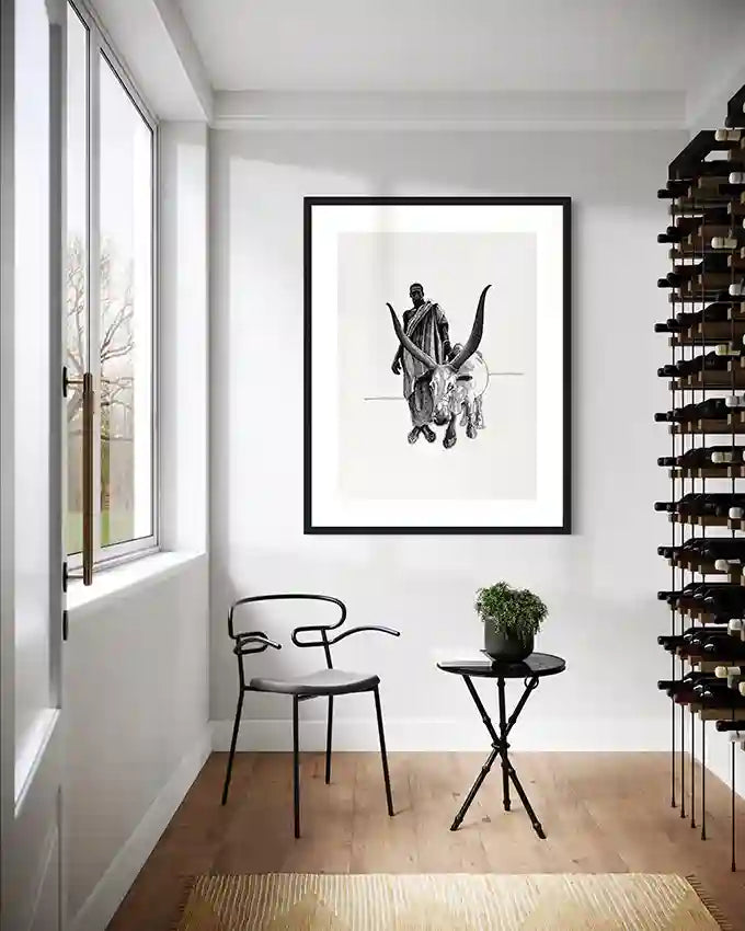 Nuba Herder black and white art print by Obada Gabir in bright minimalist reading corner with natural light and modern furniture - contemporary wall art