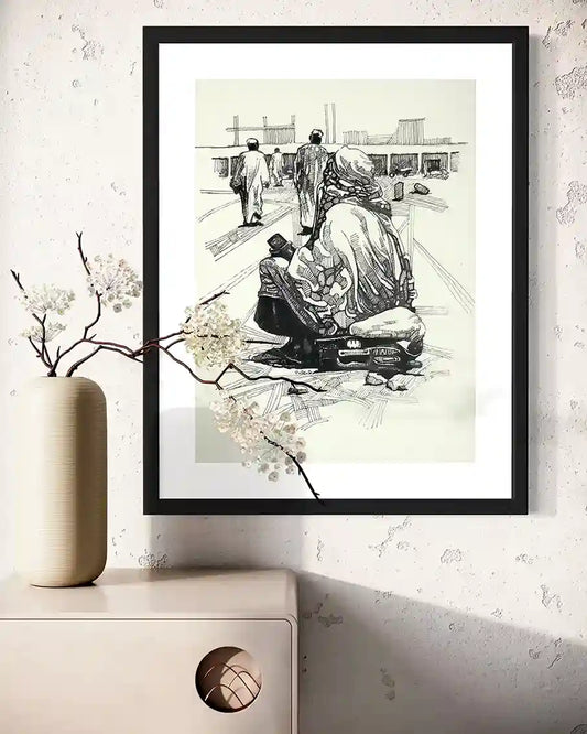 Waiting by Obada Gabir framed ink drawing mockup - Sudanese woman artwork in modern minimalist interior